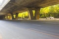 Asphalt roads and city buildings under the overpass, automobile advertising road material.